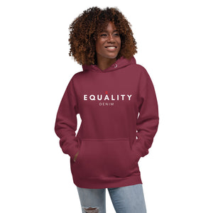 woman with curly hair in a hoodie